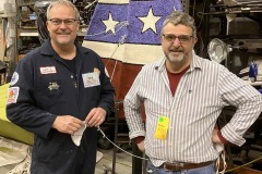 Erik C. Andersen & F. Hudson Miller pose next to the finished decorated glider --- Photo by Patricia A. Kennedy