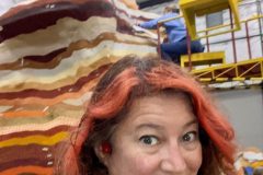 Molly takes a selfie with the float. --- Photo by Molly Shock