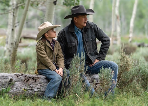 Kevin Costner, right, and Brecken Merrill in “Yellowstone.”